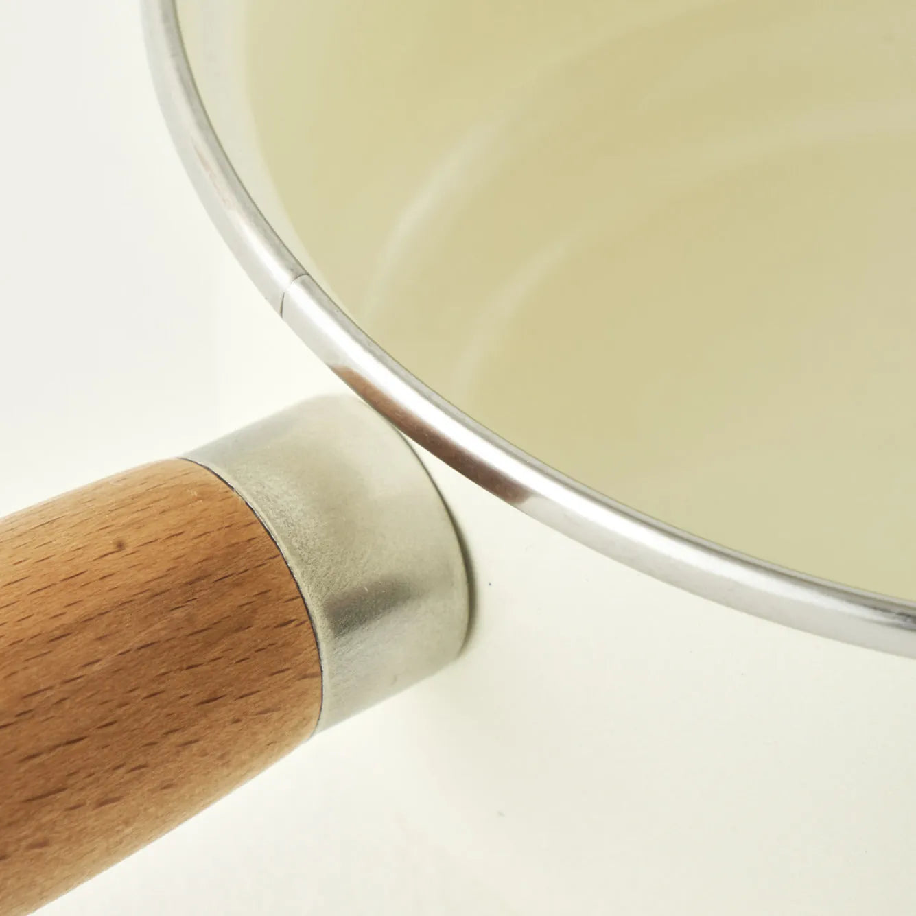 Cozy Enamel Saucepan with Wooden Handle detail view
