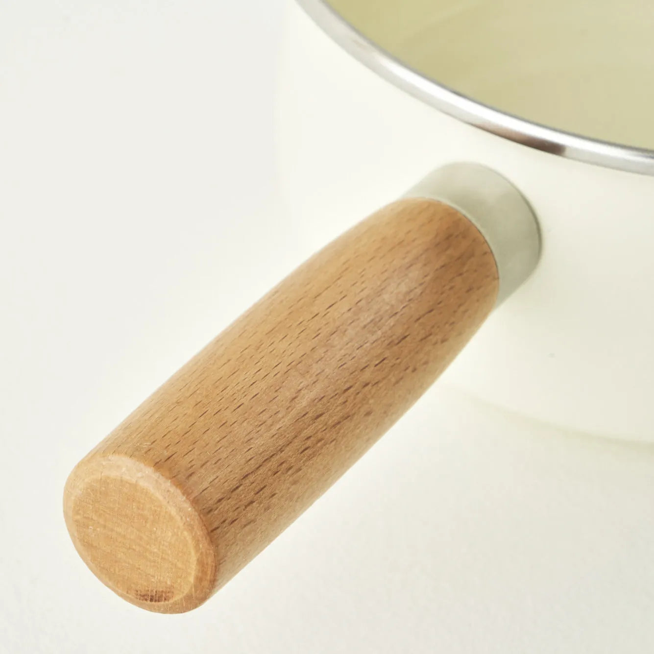 Cozy Enamel Saucepan with Wooden Handle texture detail
