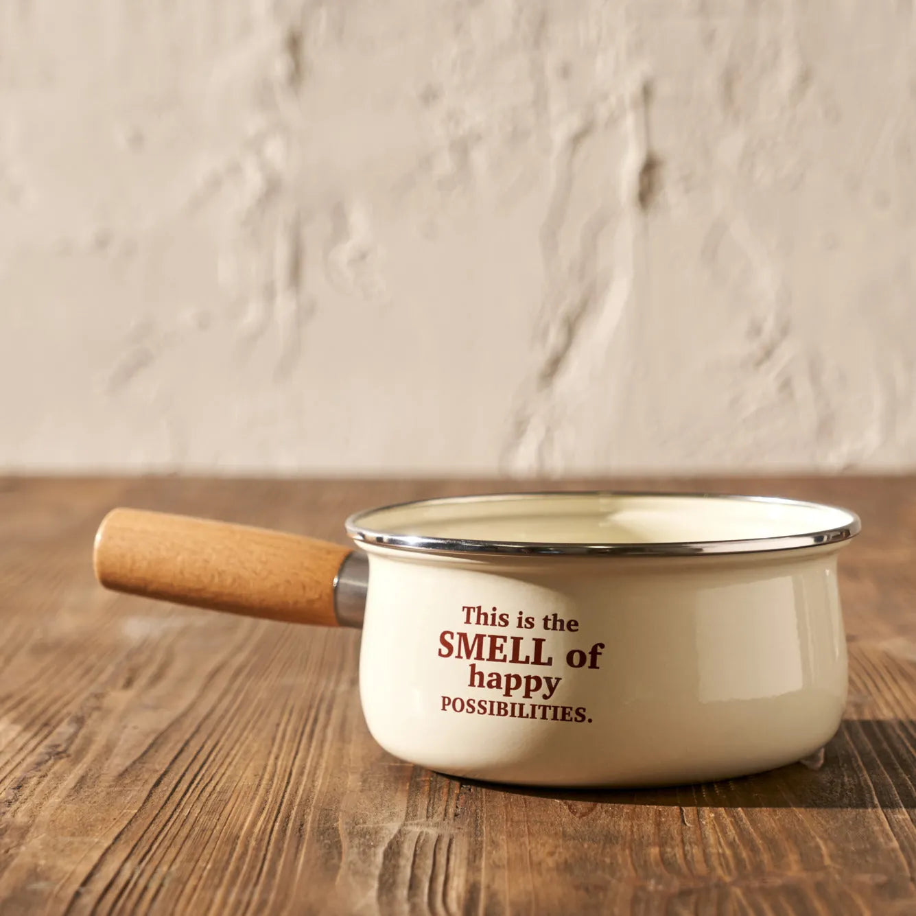 Cozy Enamel Saucepan with Wooden Handle side view