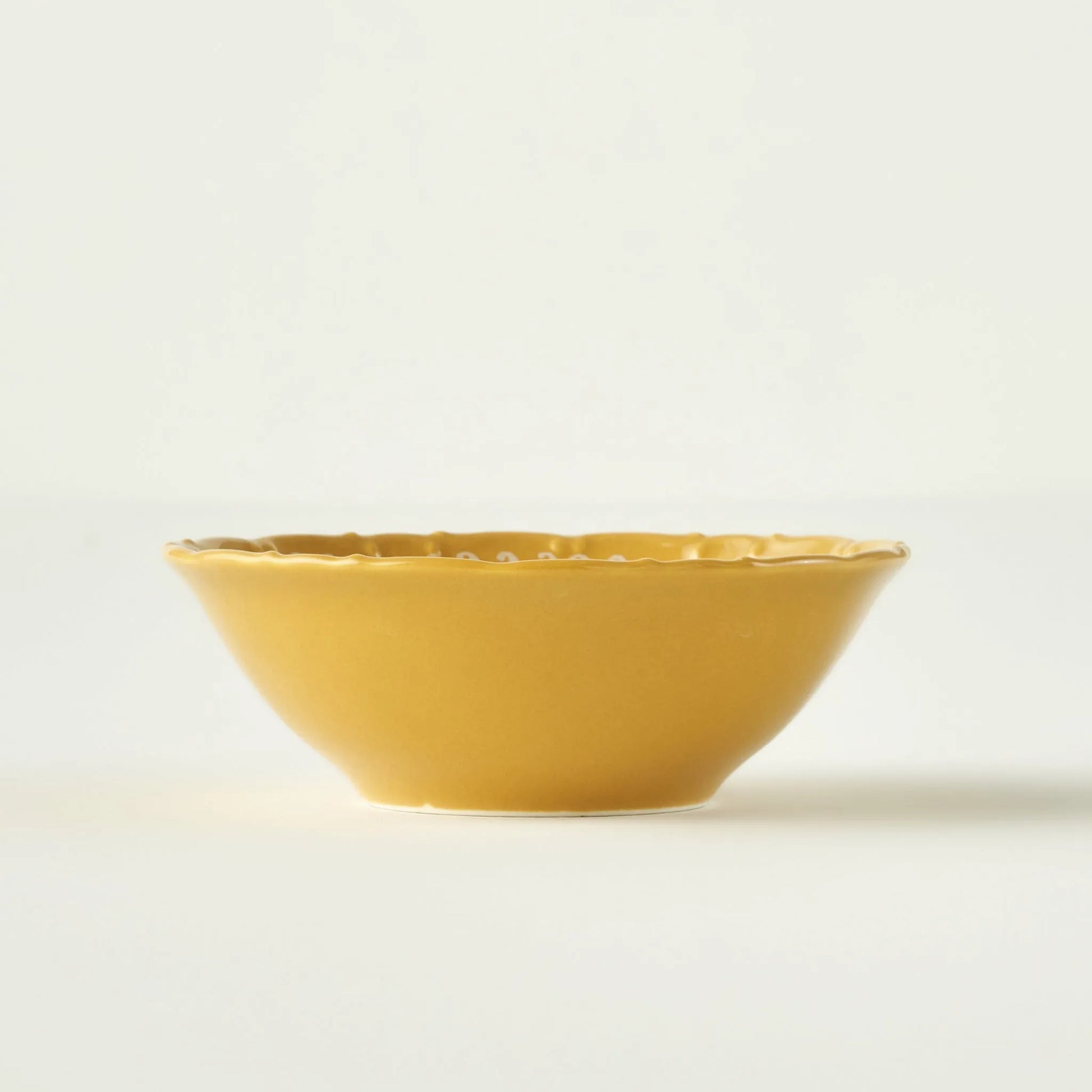 Indian 12 Piece Porcelain Mustard Dinnerware Set design detail